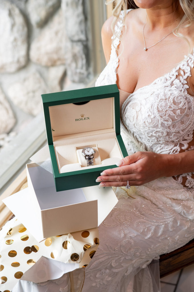 Rolex watch in a green box as a gift for a bride on her wedding day in Detroit