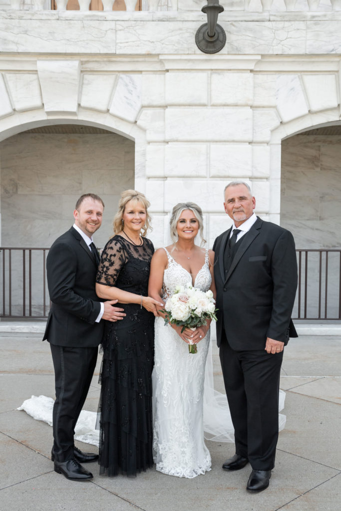 family formal wedding photos in front of the Detroit Institute of Arts 