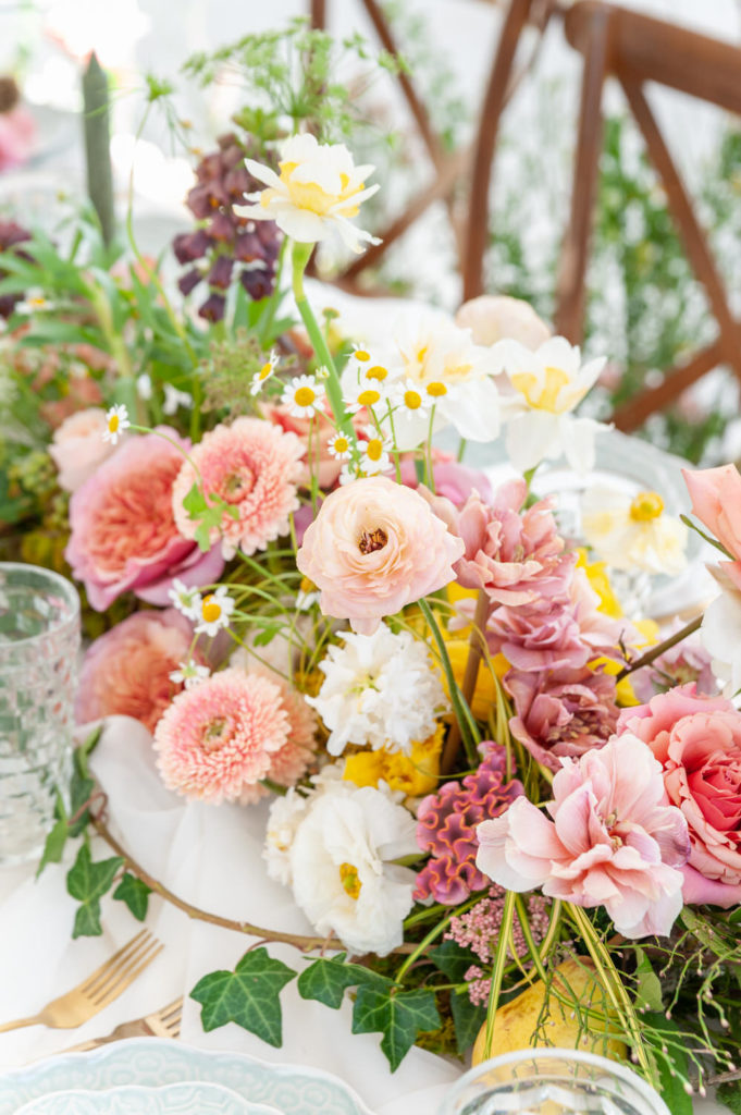bright pink floral centerpieces for a spring wedding at the White Sparrow Barn in Dallas