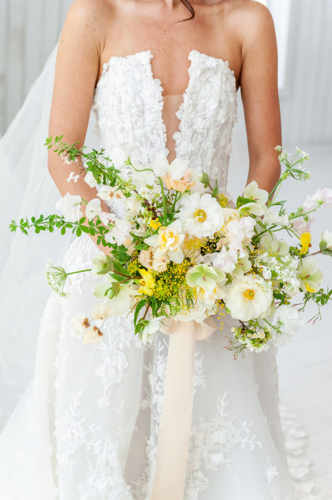 white and yellow floral bouquet for a bride's spring wedding day in Texas