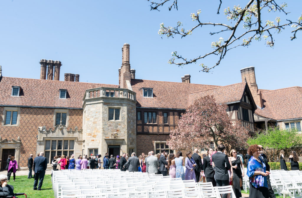 wedding guests gathering during an outdoor spring wedding