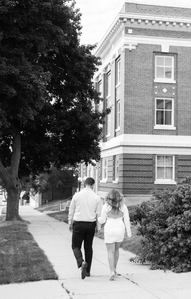 couple walking down the sidewalk