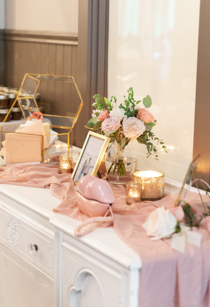 pink and white wedding reception gift table