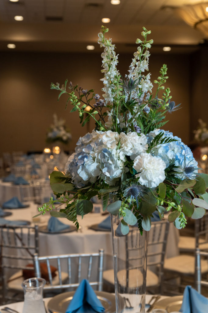 blue and white wedding centerpieces at the reception