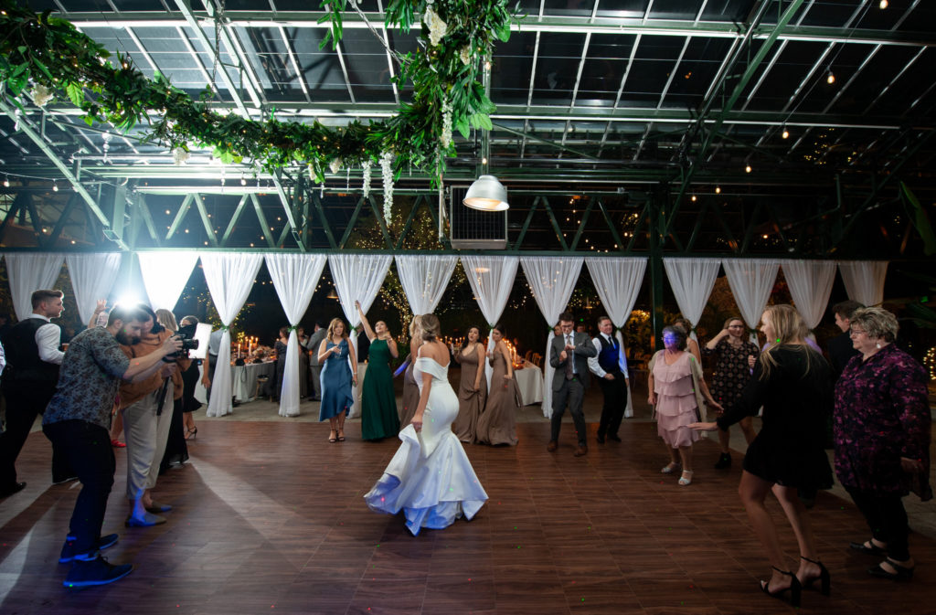 wide angle of the wedding dance floor at Planterra Conservatory greenhouse