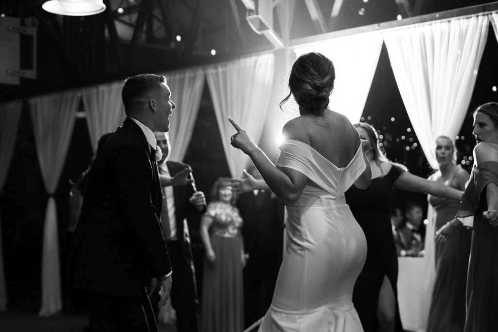 bride and groom dance the night away with their wedding guests at Planterra Conservatory