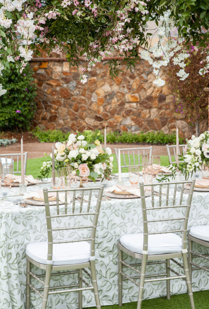 pink and white wedding reception table decor on the grand lawn at Bella Collina