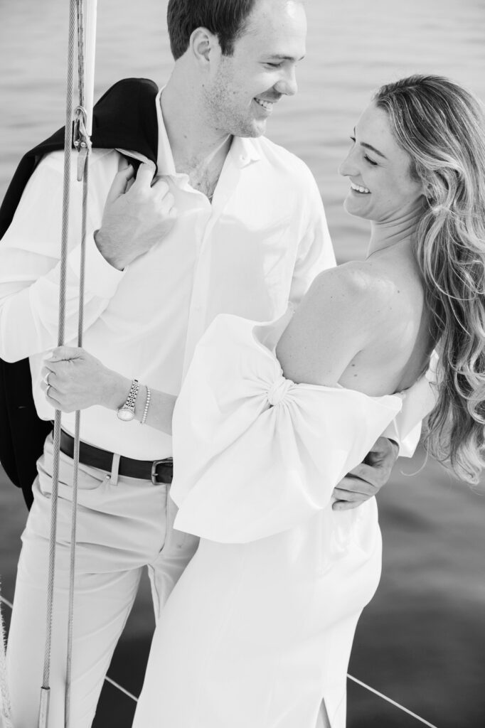 A candid moment shared between a man and woman captured by Lake Michigan engagement photographer, Kaitlyn Cole