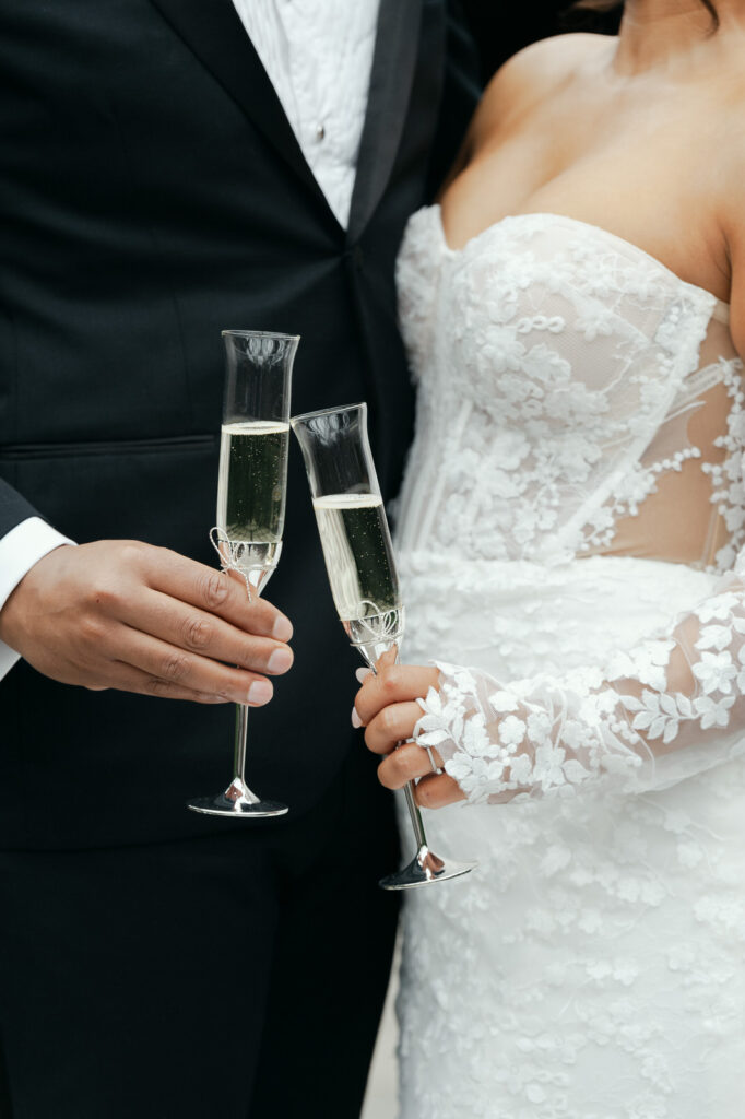 bride and groom toast their glass champagne glasses 
